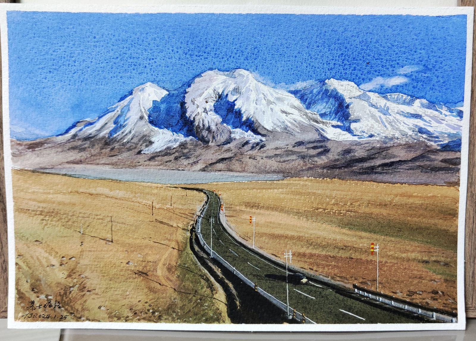 Watercolor of a highway winding through golden grassland toward snow-capped mountains