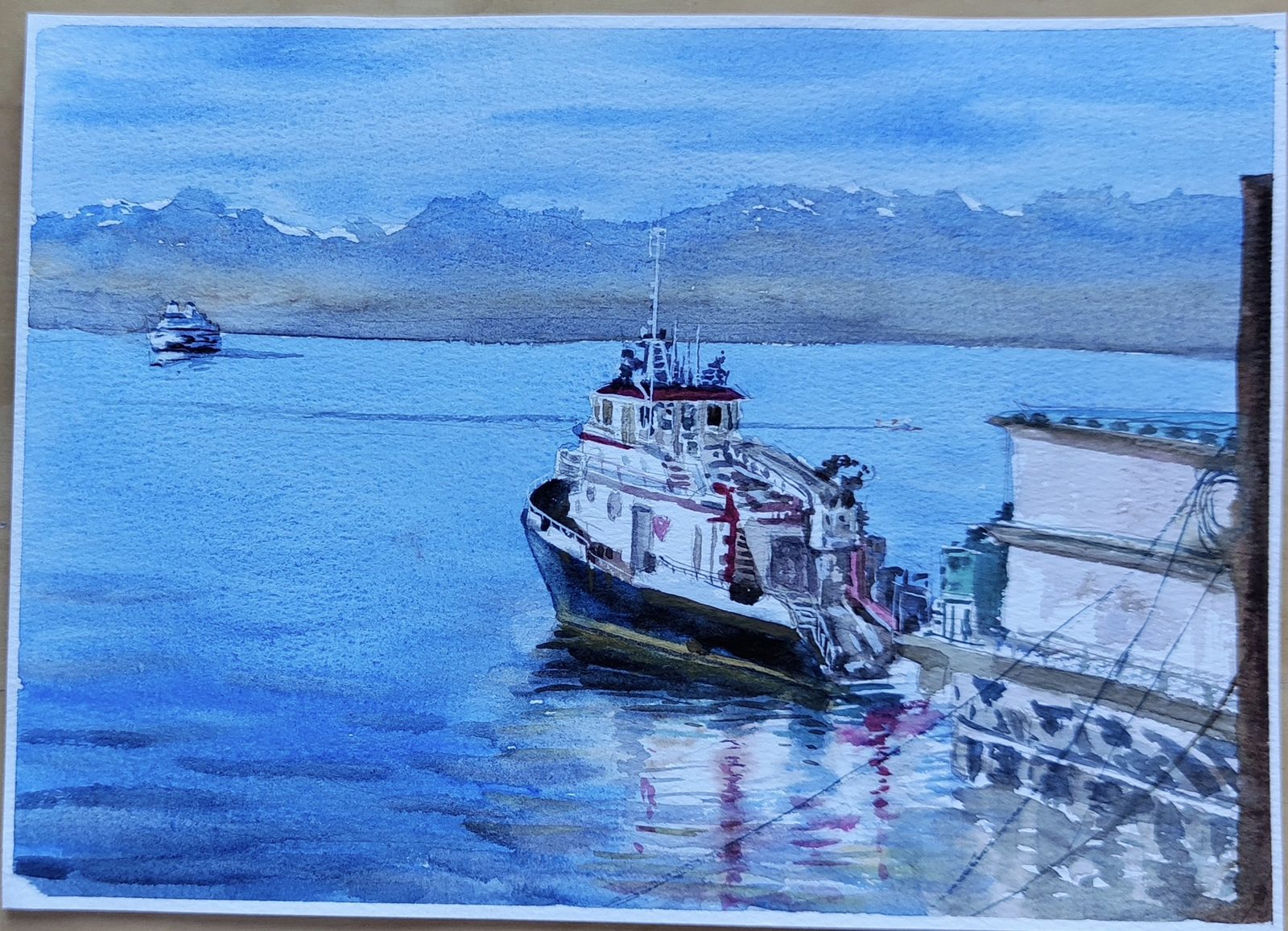 Watercolor of a tugboat moored at a pier with mountains across the Sound